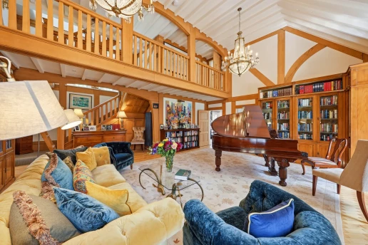Mezzanine overlooking the vaulted living room at Fieldhead, Prestbury