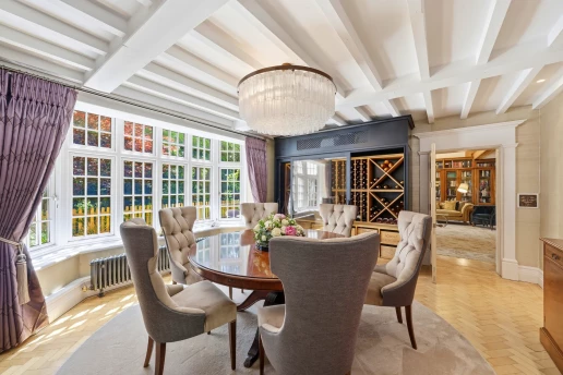 Formal dining room with garden views at Fieldhead, Prestbury