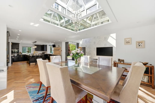 Skylit dining space with vaulted ceiling at Fieldhead, Prestbury