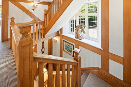 Oak staircase and light-filled landing at Fieldhead, Prestbury