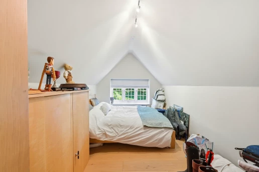 Vaulted bedroom with garden outlook at Fieldhead, Prestbury