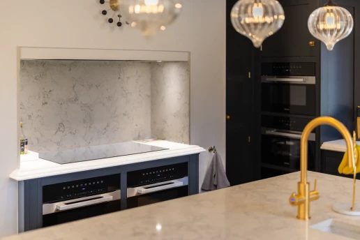Marble kitchen island and statement pendants at Fieldhead, Prestbury