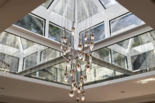 Glazed roof and crystal lighting detail at Fieldhead, Prestbury